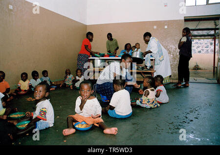 orphans getting food in a school, Don Bosco Project, Republic of the Congo, Kivu, Virunga National Park, Goma Stock Photo