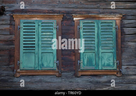 frame house with closed window shutters, Switzerland, Valais Stock Photo