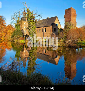 view from motte-and-bailey castle to Tueschenbroich castle in autumn, Germany, North Rhine-Westphalia, Lower Rhine, Wegberg Stock Photo