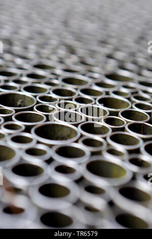 grating with tubes of different diameters, Italy, South Tyrol, Burgstall Stock Photo