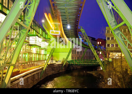 Wuppertal suspension railway over river Wupper at night, Germany, North Rhine-Westphalia, Bergisches Land, Wuppertal Stock Photo