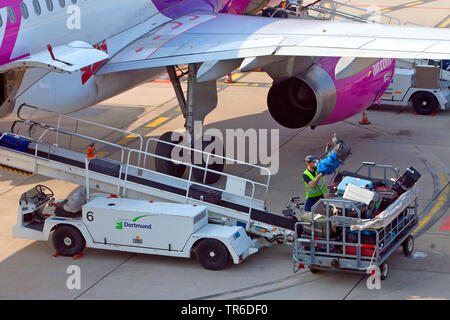 luggage unloading on the Dortmund Airport 21, Germany, North Rhine-Westphalia, Ruhr Area, Dortmund Stock Photo