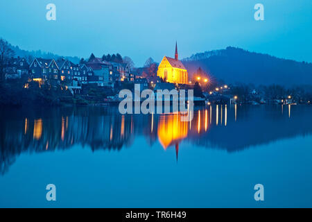 Beyenburg storage lake and illuminated St Mary Magdalene church in the evening, Germany, North Rhine-Westphalia, Bergisches Land, Wuppertal Stock Photo