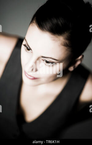 attractive, dark haired woman in portrait Stock Photo