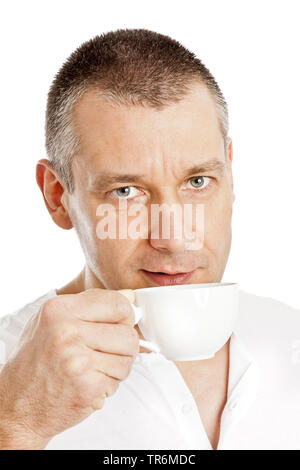 handsome man with a cup of coffee, Germany Stock Photo