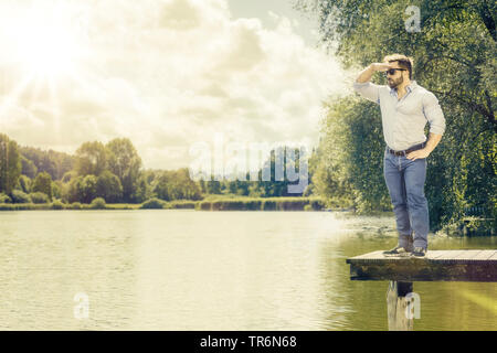 attractive man ion vacation at lake Starnberg, Germany, Bavaria Stock Photo