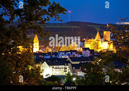 view of the city with illuminated Genovevaburg in the evening, Germany, Rhineland-Palatinate, Eifel, Mayen Stock Photo