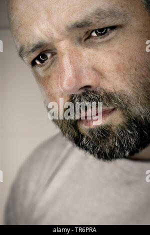 melancholic man with beard, Germany Stock Photo