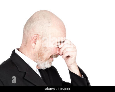 old man in a black jacket with bald head and grey beard, Germany, Bavaria Stock Photo