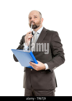Middle-aged businessmann thinking about solutions and holding folder, Germany Stock Photo