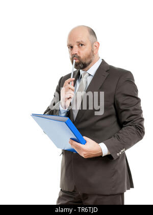 Middle-aged businessmann thinking about solutions and holding folder, Germany Stock Photo