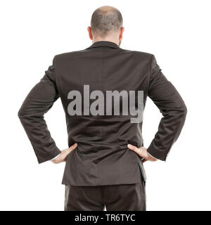 Confident middle-aged businessmann standing with arms akimbo, Front view, Germany Stock Photo
