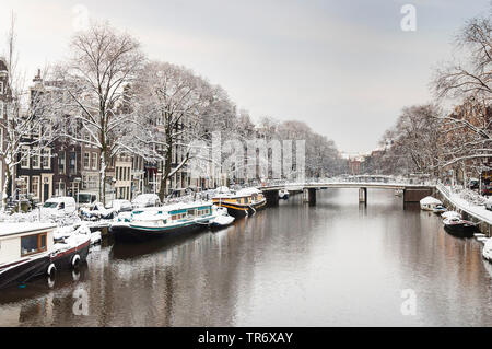 Cityscape of snow-covered Amsterdam, Netherlands, Noord-Holland, Amsterdam Stock Photo