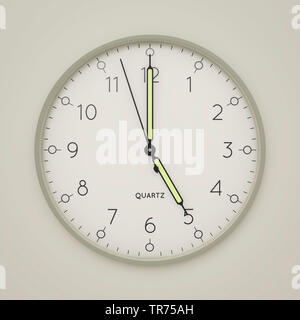 white clock against grey background at 5 o'clock Stock Photo