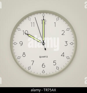 white clock against grey background, just before 10 o'clock Stock Photo
