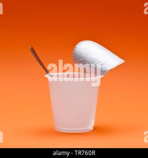 empty yoghurt pot, Germany Stock Photo