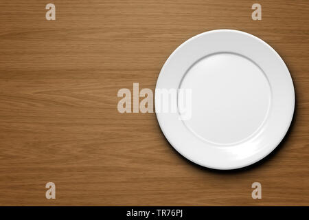 empty plate on a wooden desk Stock Photo
