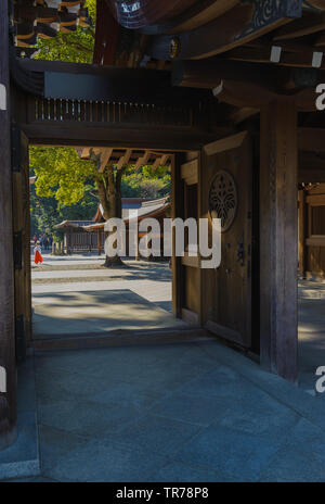 Entrence are of Meiji Shrines (Meiji-Jingu) mein building or inner district of shrine with high contrast from harsh sunlight, Japan October 2018 Stock Photo