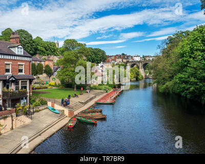 Rowing boats on the River Nidd and the viaduct from High Bridge at Knaresborough North Yorkshire England Stock Photo