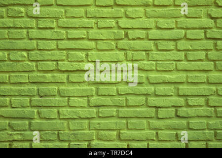 Lime Green Colored Old Brick Wall for Background, Banner or Wallpaper Stock Photo