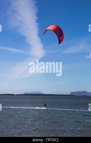 One person kitesurfing on the lake Stock Photo