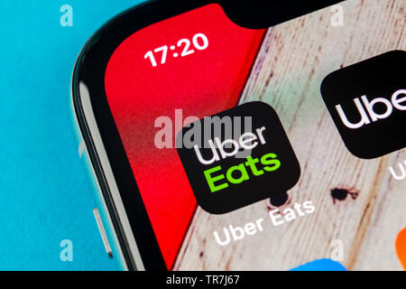Sankt-Petersburg, Russia, September 19, 2018: Uber Eats application icon on Apple iPhone X smartphone screen close-up. Uber eats app icon. Social netw Stock Photo