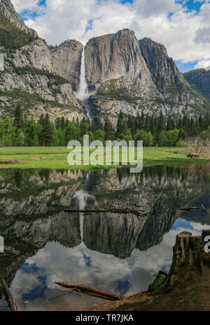 Thundering Yosemite Falls with perfect reflection, Yosemite National Park, California