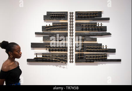 October Gallery, London, UK. 30th May 2019. LR Vandy's solo exhibition ‘Hidden’ runs from 29th May - 29th June, featuring new Hull series works by the artist, transforming model boats into ‘masks’, animated with fishing floats, acupuncture needles and darts. Credit: Malcolm Park/Alamy Live News.