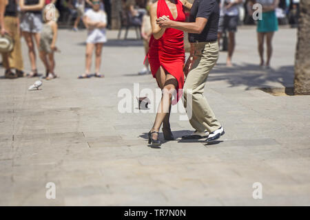 Street couple dancers performing Argentine tango dance Stock Photo