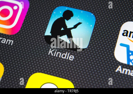 Sankt-Petersburg, Russia, February 21, 2018: Amazon Kindle application icon on Apple iPhone X screen close-up. Amazon Kindle app icon. Amazon kindle a Stock Photo