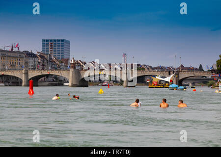 In Basel, it is customary to swim down the Rihn river on hot summer ...