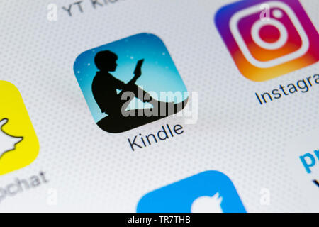 Sankt-Petersburg, Russia, March 1, 2018: Amazon Kindle application icon on Apple iPhone X screen close-up. Amazon Kindle app icon. Amazon kindle appli Stock Photo