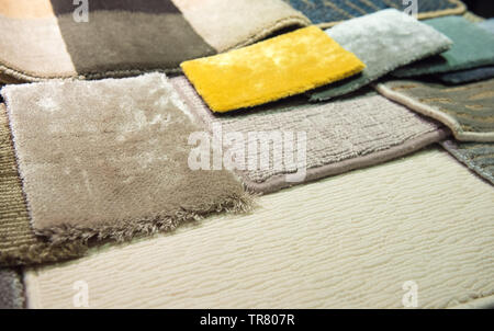 Multiple Carpet Samples Arranged on Floor Stock Photo