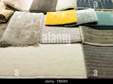 Multiple Carpet Samples Arranged on Floor Stock Photo