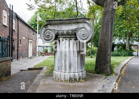 The capital of an ionic pillar outside Vestry House museum in Church Lane, Walthamstow, London, UK Stock Photo
