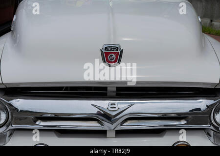 Stekene, Belgium, 26 May 2019, photo detail of the front of a ford v8 from 1956 Stock Photo