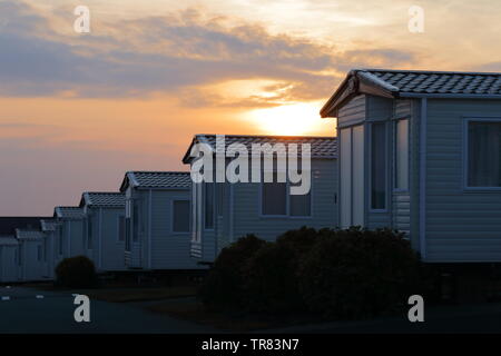 Beautiful sunset over a holiday park Stock Photo