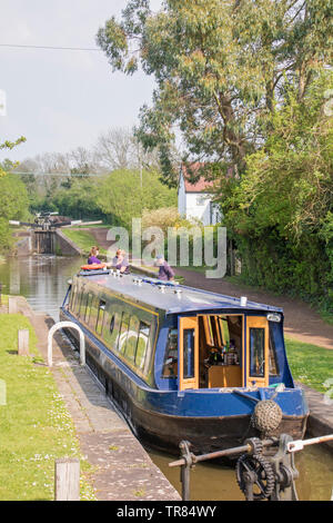 Boating down the Tardebigge flight near Tardebigge, Worcester and Birmingham Canal  Worcestershire, England, UK Stock Photo