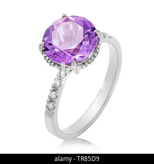 Beautiful white gold ring with large amethyst and small cubic zirconias, isolated on white background Stock Photo