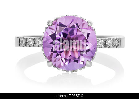 White gold ring with large amethyst and small cubic zirconias, isolated on white background Stock Photo