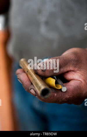 Tools for making firworks at Cesar Urban Silva's firework factory on the outskirts of Tultepec. The 'Castillos' or castles of Tultepec is a yearly tra Stock Photo