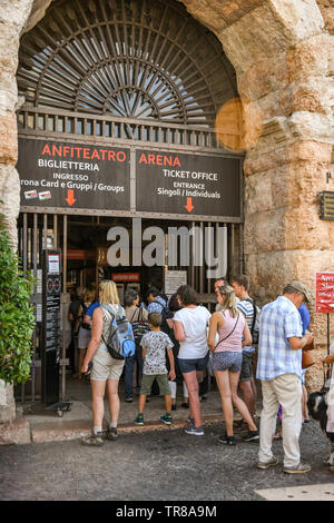 VERONA, ITALY - SEPTEMBER 2018: People queuing at the entrance to Verona Arena, which is a Roman amphitheatre in the city centre. Stock Photo