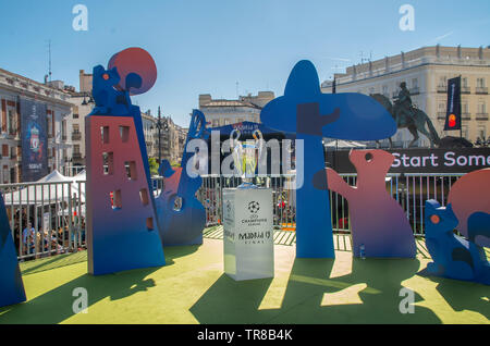 Madrid, Spain, 30th May 2019. UEFA Champions League Trophy is exhibited at Puerta del Sol square in Madrid for fans to see it and take pictures with it before the gran final Liverpool vs. Tottenham that will take place on the 1st of June.  Credit: Lora Grigorova Stock Photo