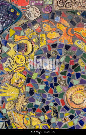 tile mosaic on bus stop bench, Broadway Blvd., Albuquerque, New Mexico Stock Photo