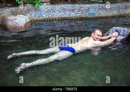 Fishmassage, Fish Spa, Pedicure fish spa feet wellness skin care treatment. Stock Photo