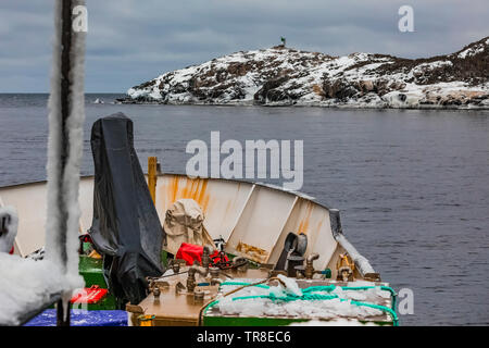 Mouth of the fjord containing the outport of Grey River, where it enters the Atlantic Ocean, Newfoundland, Canada Stock Photo