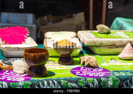 Selling sea shells in the local market, Rarotonga, Aitutaki, Cook Islands. With selective focus Stock Photo