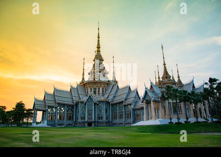 Beautiful temple thailand colorful sky twilight sunset - Landmark Nakhon Ratchasima province temple at Wat None Kum in Thailand Stock Photo