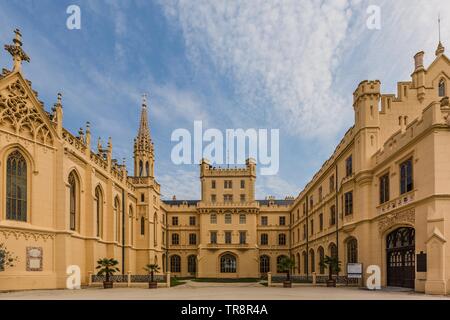 Lednice, Czech Republic - May 27 2019: Front view of famous chateau Lednice in South Moravia with yellow facade. It belongs to UNESCO heritage. Stock Photo