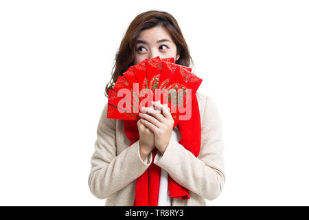 Happy young woman holding red envelopes Stock Photo